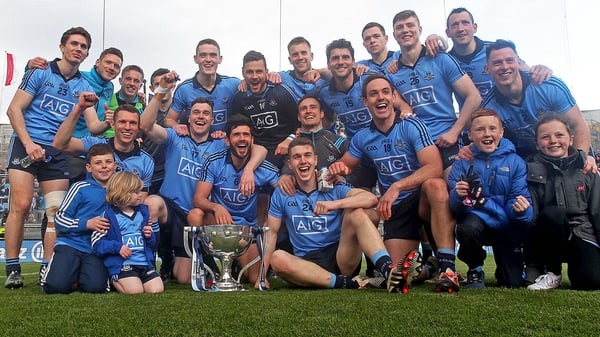 The Dublin team and supporters celebrate with the Division 1 trophy