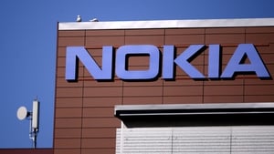 Nokia's profits dropped due to lower software sales and higher R&D costs