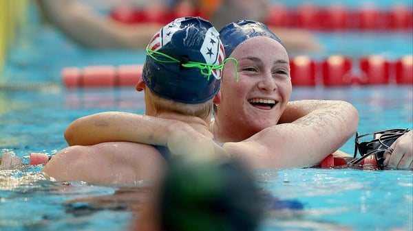 Lindsay Stone and Kendall Brent embrace at the end of the 1500 metre Freestyle