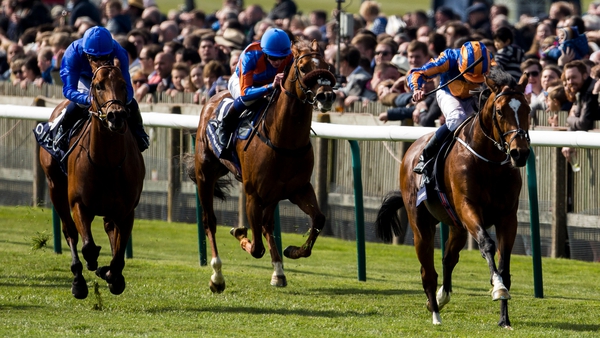 Gleneagles ridden by Ryan Moore leads the field home to win the QIPCO 2000 Guineas Stakes