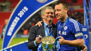 Jose Mourinho in happier times with Chelsea captain John Terry after winning last season's league cup