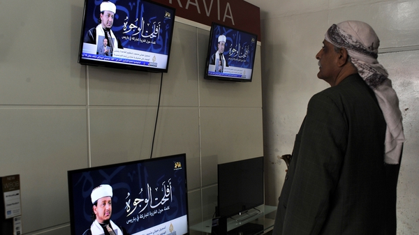 Nasser bin Ali al-Ansi pictured on the tv screens was killed with his son and other fighters