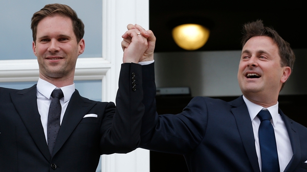 Prime Minister Xavier Bettel (R) and Gauthier Destenay (L) are pictured following the private ceremony