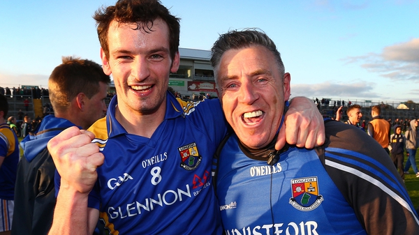 Longford's Barry Gilleran and manager Jack Sheedy celebrate after the game