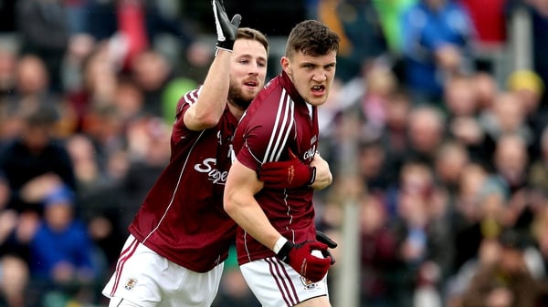 Damien Comer (r) goaled for Galway just before half-time