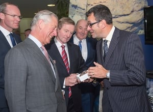 Enda Kenny looks on as a 330 million year old fossil from near Mullaghmore was presented to Prince Charles, by Professor Andy Wheeler at the Marine Institute