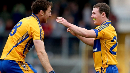 Clare's Gary Brennan celebrates with Davy O'Halloran at the final whistle