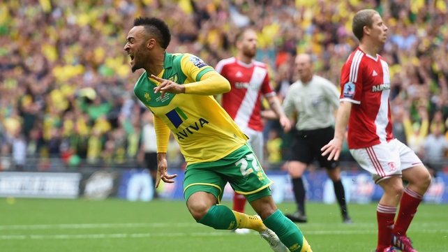 Adam Redmond celebrates the Canaries' second goal