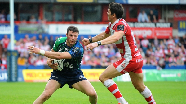 Connacht's Robbie Henshaw under pressure from Gloucester's James Hook during the game
