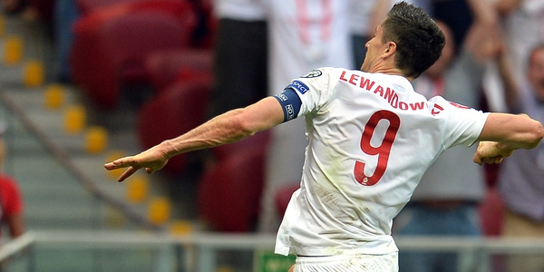 Robert Lewandowski's late hat-trick helped Poland to a vital win