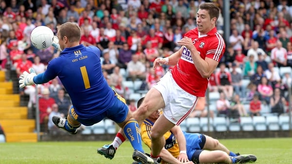 Cork's Conor Dorman has his shot saved by goalkeeper Joe Hayes of Clare