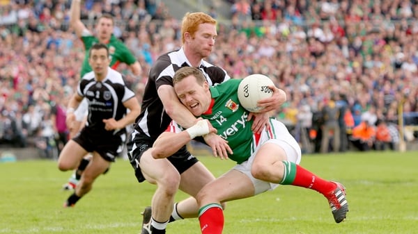 Mayo's Andy Moran and Ross Donovan of Sligo in action during the 2012 Connacht final at Hyde Park