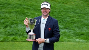 Bubba Watson with winner's trophy after the final round of the Travelers Championship at TPC River Highlands