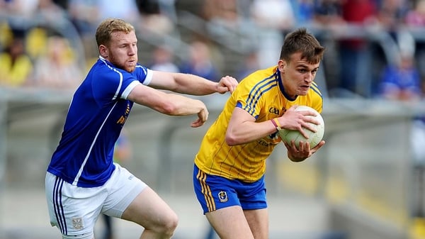 Roscommon’s Enda Smith with Rory Dunne of Cavan