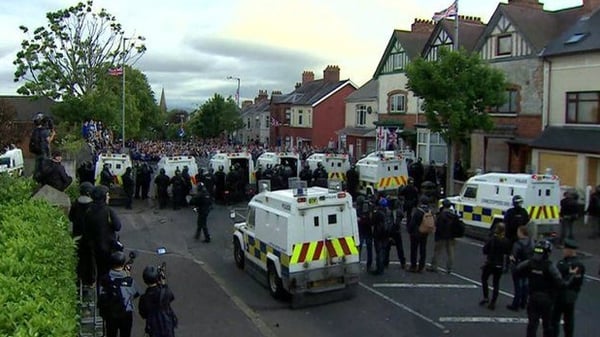 A number of people were injured after loyalists rioted in Belfast when a contentious Orange Order parade was halted in July