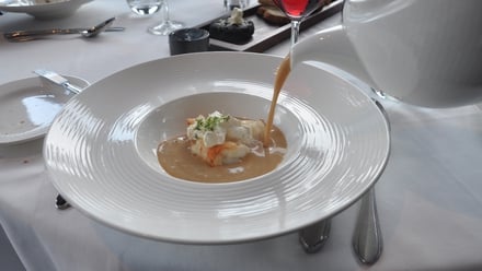 Langoustine, white chocolate and seaweed soup at Lava Restaurant