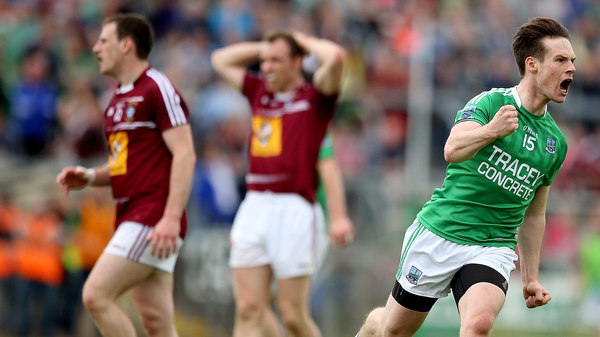 Tomás Corrigan turns away in delight after firing over another point at Breffni Park