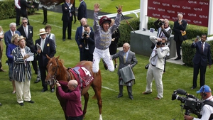 Frankie Dettori celebrates another high-profile success as he spectacularly dismounts Galileo Gold