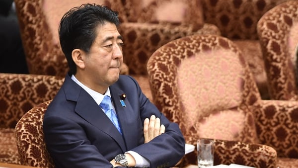 There is no specific mention of wiretapping Shinzo Abe