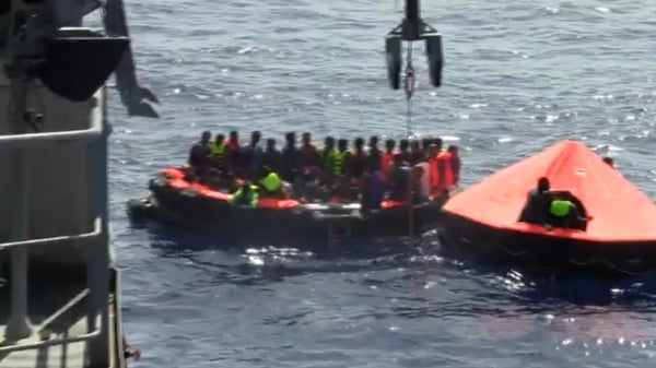 Migrants are rescued by LÉ Niamh crew members (Pic: Irish Defence Forces)