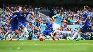 Sergio Aguero guides home City's first against Chelsea
