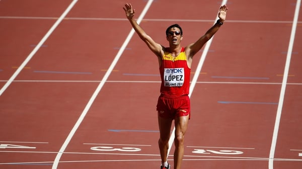 Miguel Angel Lopez celebrates gold