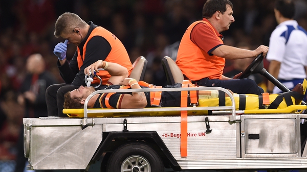 Leigh Halfpenny leaves the field on a stretcher during the World Cup warm up match against Italy at the Millennium Stadium, Cardiff