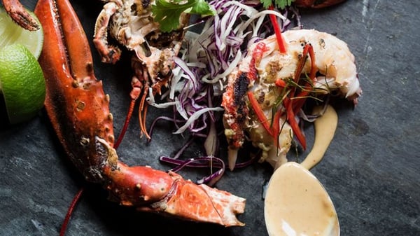 A chargrilled whole lobster.