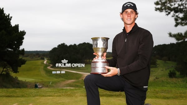 Thomas Pieters poses with the KLM Open trophy