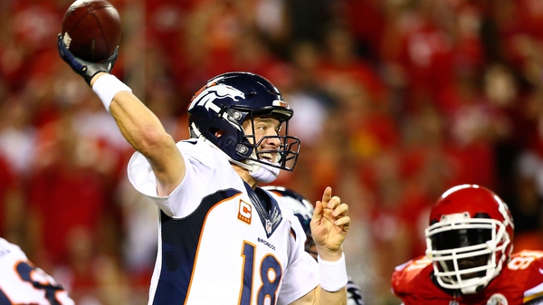 Peyton Manning of the Denver Broncos throws a pass during the game against the Kansas City Chiefs