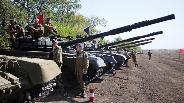 Pro-Russian separatists take part in a military competition between tank units near the town of Torez, near Donetsk