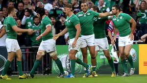 Rob Kearney (R) celebrates scoring Ireland's fifth try with Simon Zebo