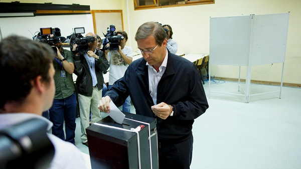 Portuguese Prime Minister and Social Democratic Party's leader Pedro Passos Coelho casts his vote
