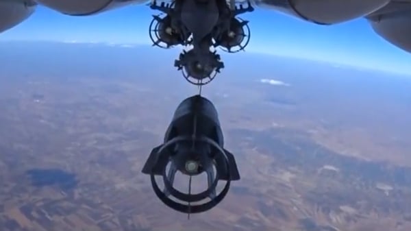 A Russian plane conducts air strikes in Syria