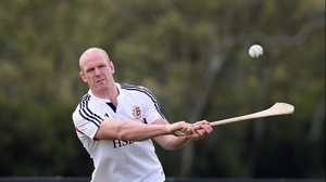 Paul O'Connell plays hurling during training at the 2013 Lions tour of Australia
