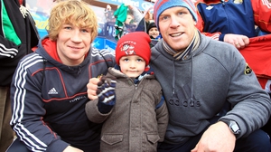 With Munster team-mate Jerry Flannery and young fan Charlie Mulqueen at a 2011 training session
