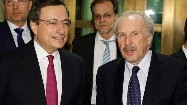 ECB chief Mario Draghi and governing council member Ewald Nowotny