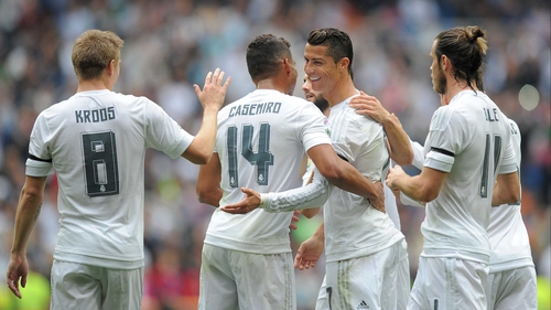 Ronaldo is congratulated by team mates