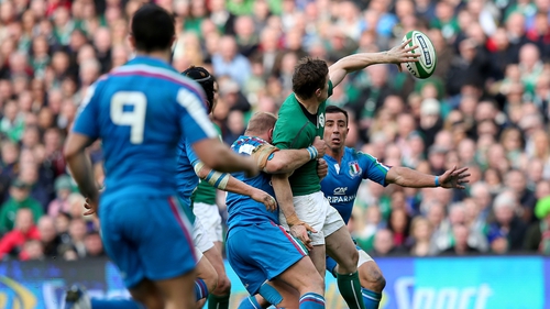 Brian O'Driscoll offloads the ball during his tour de force against Italy in the 2014 Six Nations