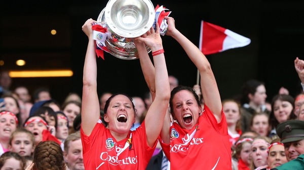Gemma O'Connor and Orla Cotter lift the O'Duffy Cup at Croke Park