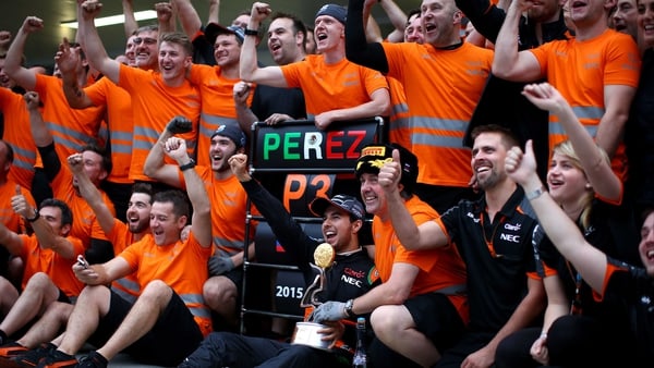 Force India celebrate Sergio Perez's third place finish in the Formula One Grand Prix of Russia in October
