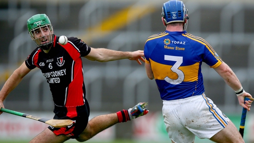 Shaun Murphy of Oulart The Ballagh (L) and Clough-Ballacolla's Darren Maher compete for the ball