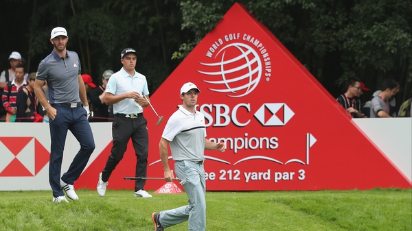Dustin Johnson, Rickie Fowlerand Rory McIlroy during the first round at Sheshan International