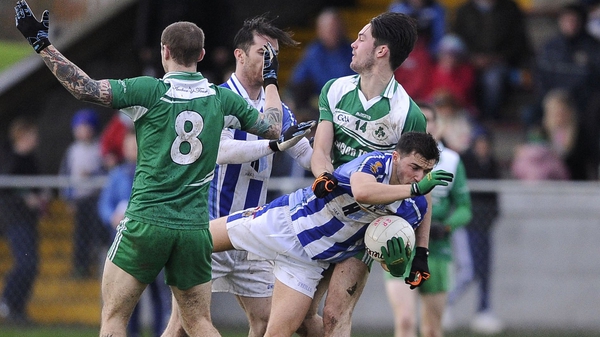 Ballyboden goalscorer Colm Basquel is tackled by Eoin O'Conner of St Patrick's