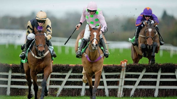 David Mullins on Nichols Canyon clears the last ahead of Ruby Walsh on Faugheen and Paddy Mullins on Wicklow Brave