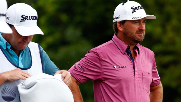 Graeme McDowell has five holes to play in Mexico