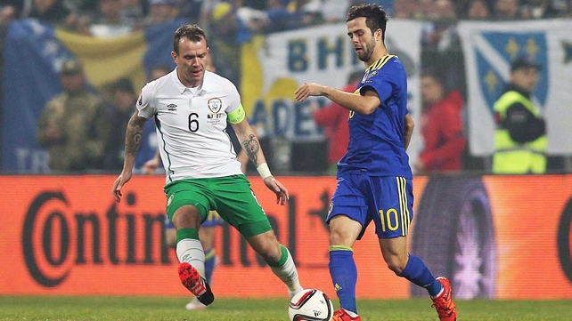 Miralem Pjanic and Glenn Whelan