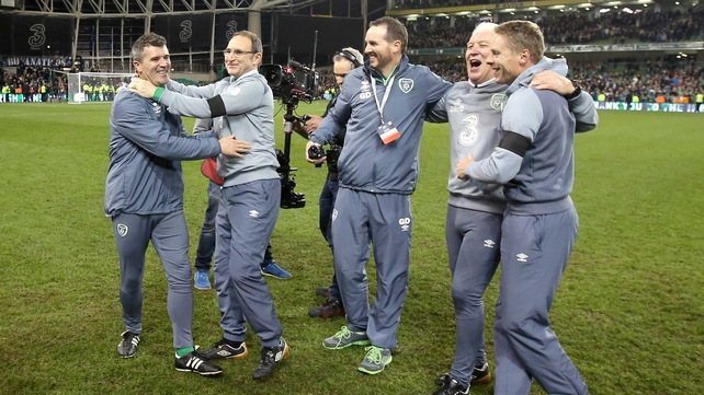 The Ireland management and coaching team celebrate at full-time