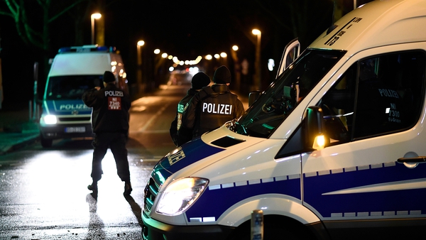 Police forces secure a scene at the HDI-Arena in Hanover, Germany