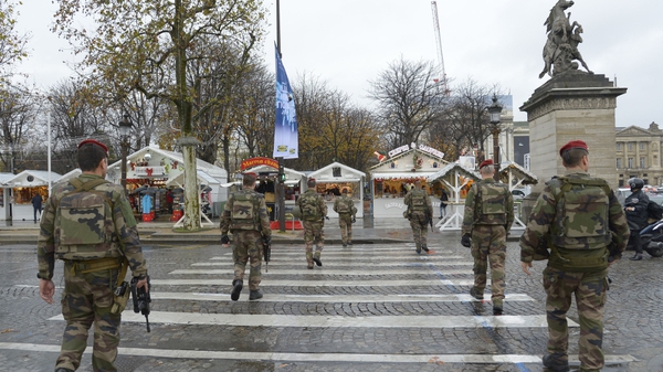 French soldiers patrol the Champs-Élysées